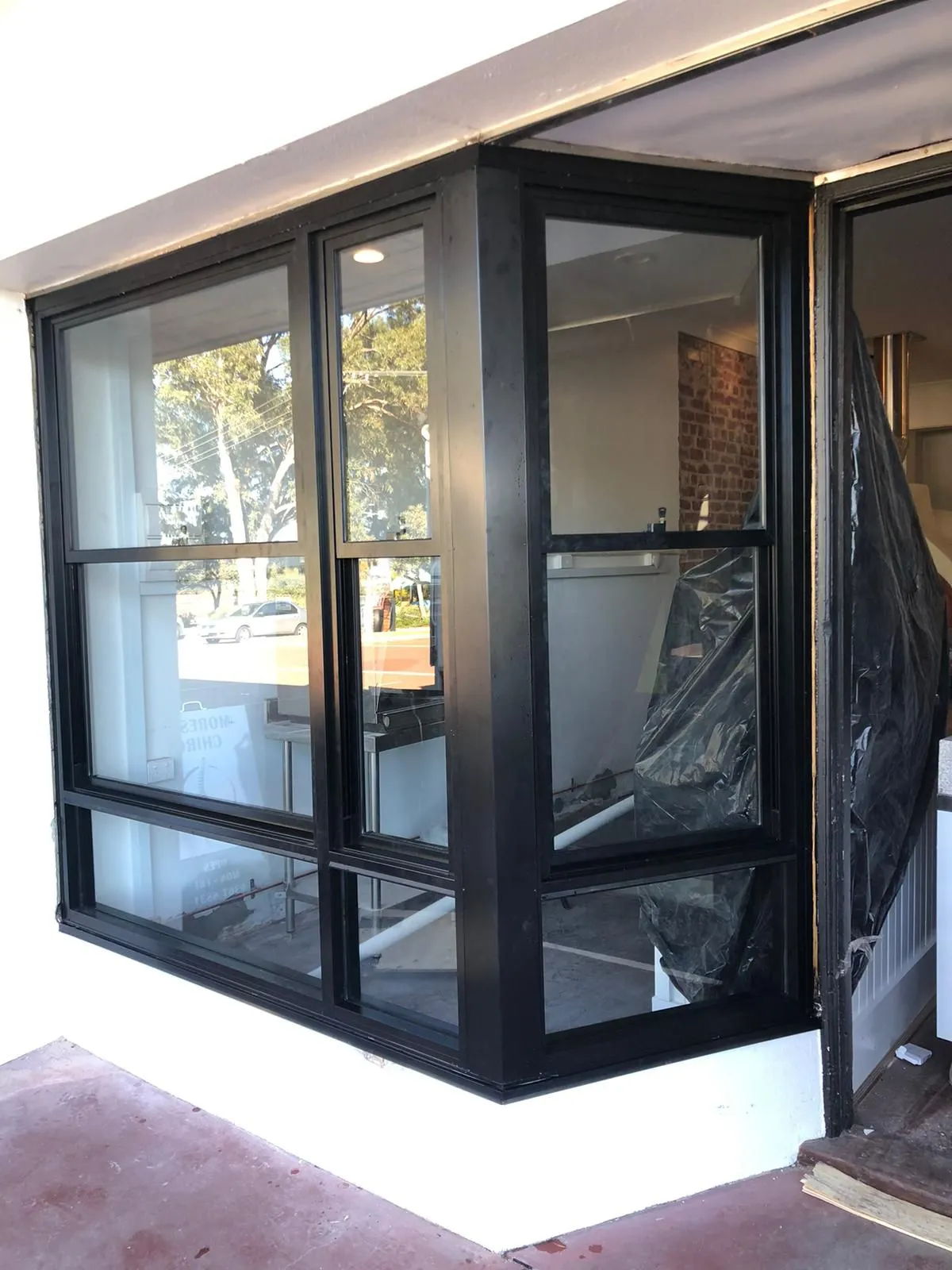 Black framed corner windows